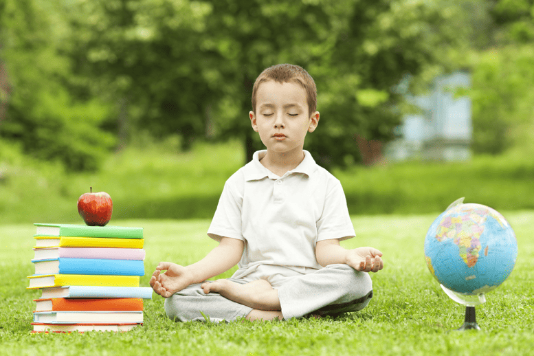 a child practicing mindfulness meditation
